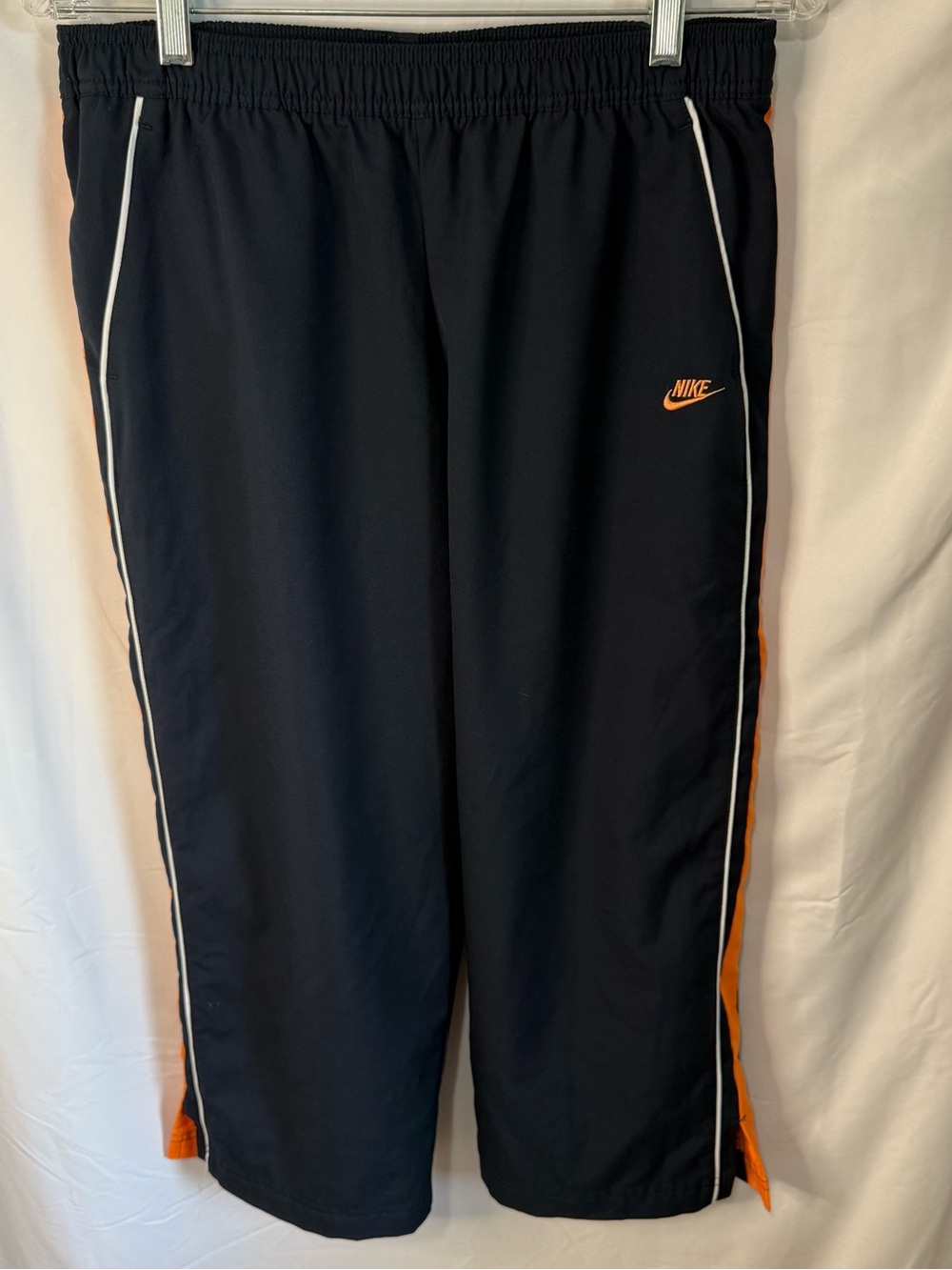 Women’s Nike Black Capri Track Pants with Orange and White Trim